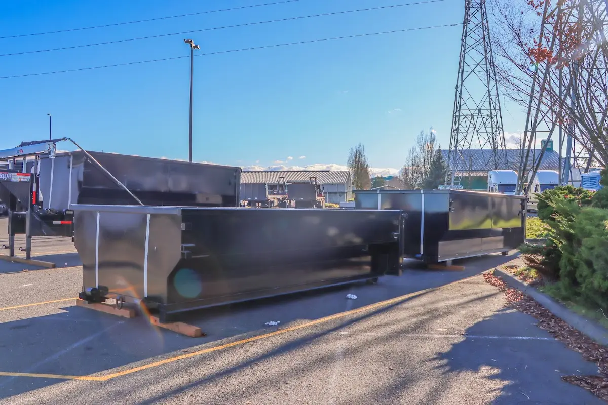 Roll-off dumpster ready for waste disposal at job site for 2 Yard Dumpster Rental in Salida